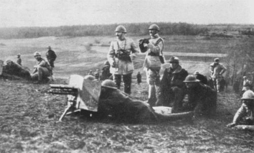 CAPT. CHEVALIER, OF THE FRENCH ARMY, INSTRUCTING AMERICAN OFFICERS IN THE USE OF THE ONE-POUNDER